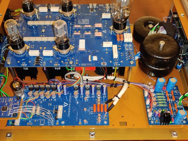 Two decks of boards inside a gold chassis